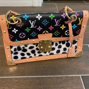 Medium multicolor purse. Never used. As is.